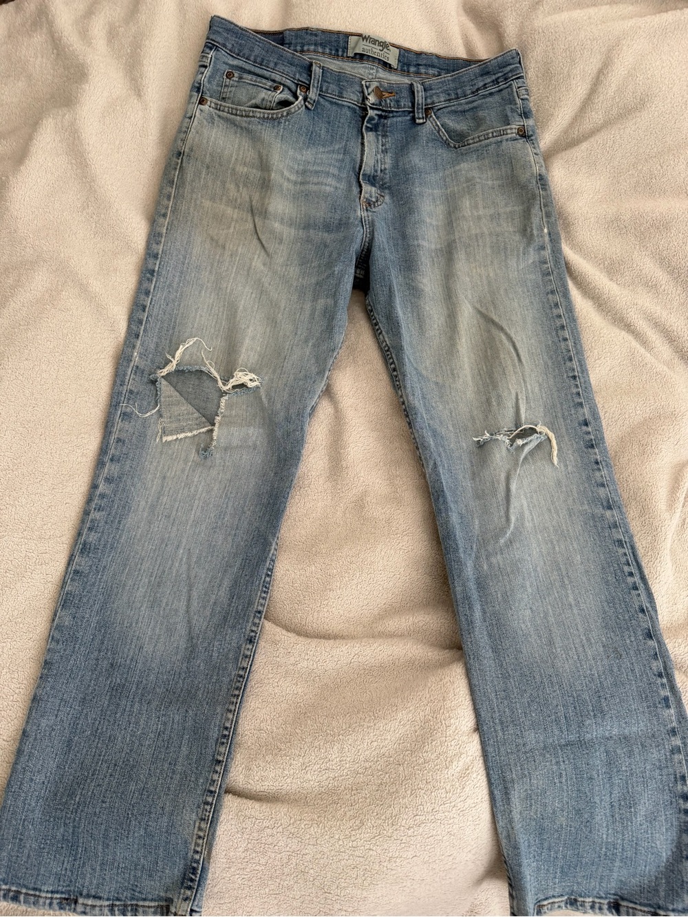 Wrangler Men’s Light Blue Distressed Bootcut Jeans